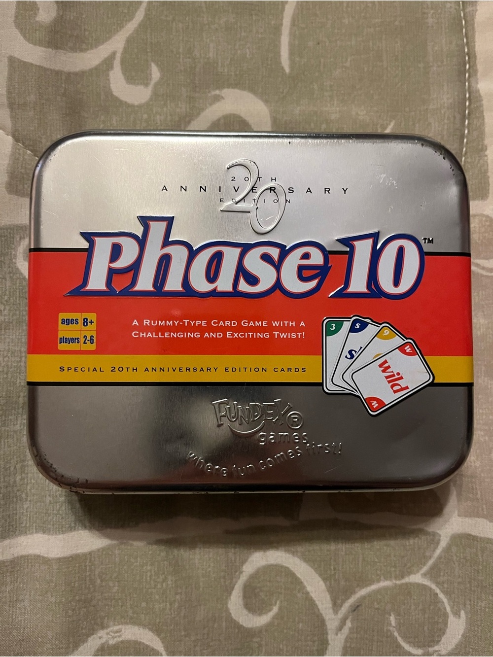 Phase 10 20th Anniversary Card Game Tin - Silver/Red